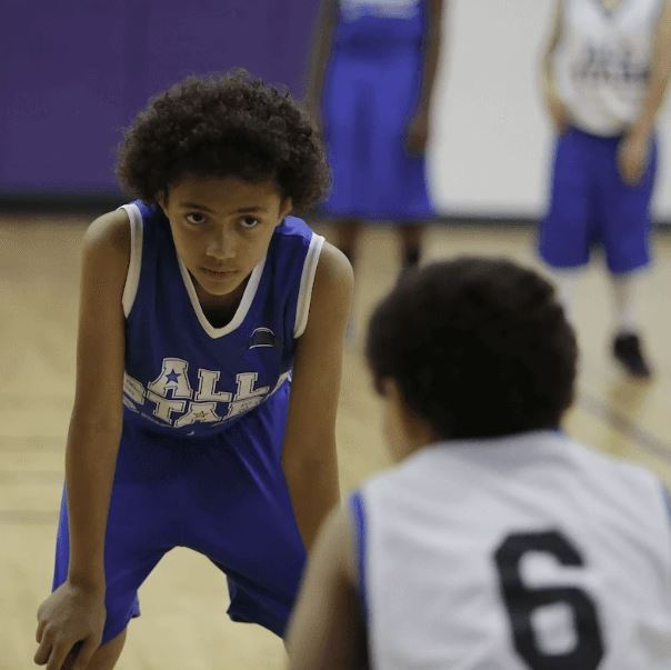 Youth playing basketball